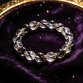 Black Rutilated Quartz natural stone bracelet on dark velvet