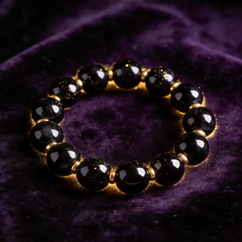 Black Obsidian natural stone bracelet on dark velvet