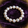 Pearl natural stone bracelet on dark velvet