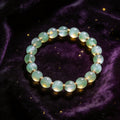 Prehnite natural stone bracelet on dark velvet
