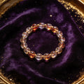 Red Rutilated Quartz natural stone bracelet on dark velvet