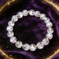 White Phantom Quartz natural stone bracelet on dark velvet
