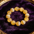 Yellow Agate natural stone bracelet on dark velvet